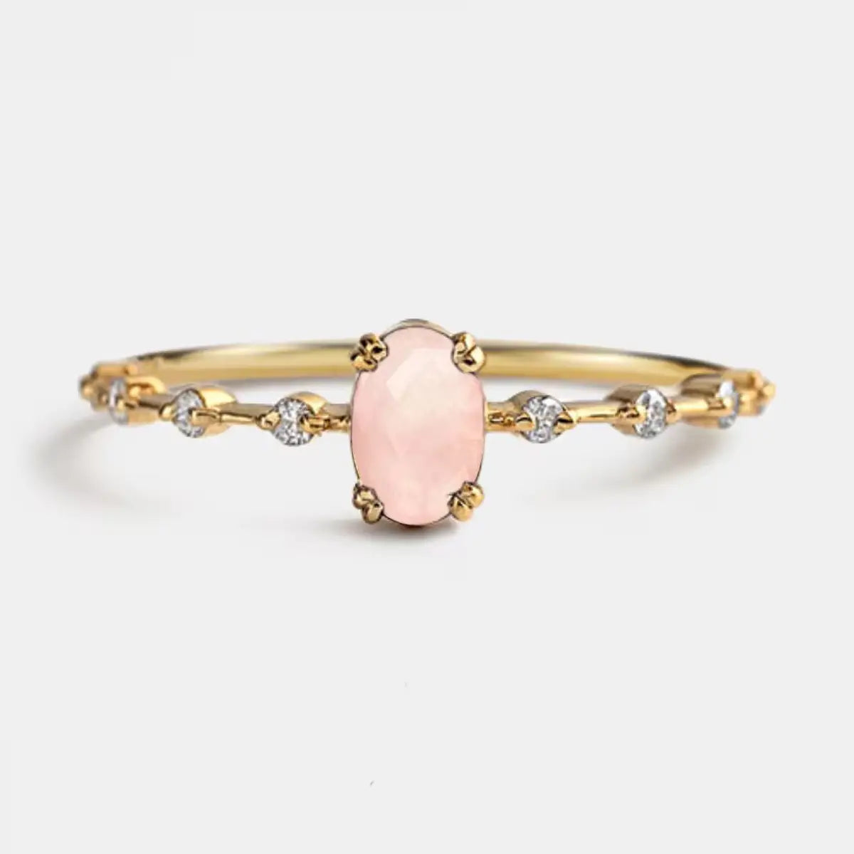 Natural oval rose quartz ring