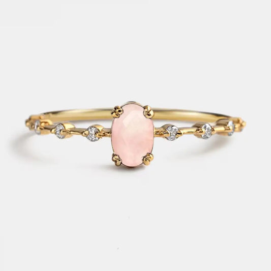 Natural oval rose quartz ring