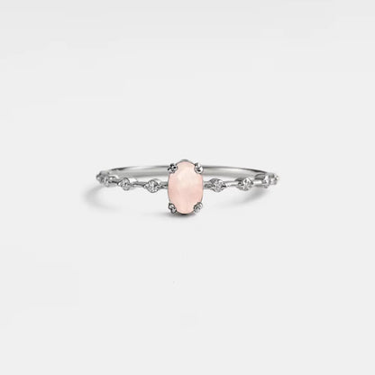 Natural oval rose quartz ring