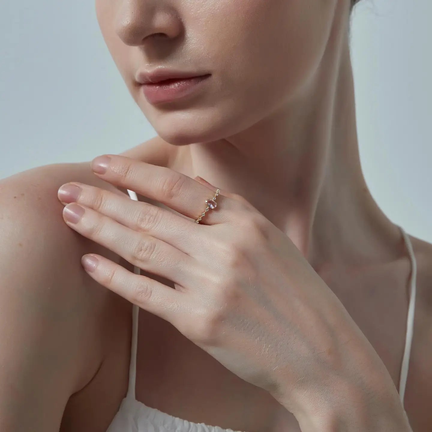 Natural oval rose quartz ring