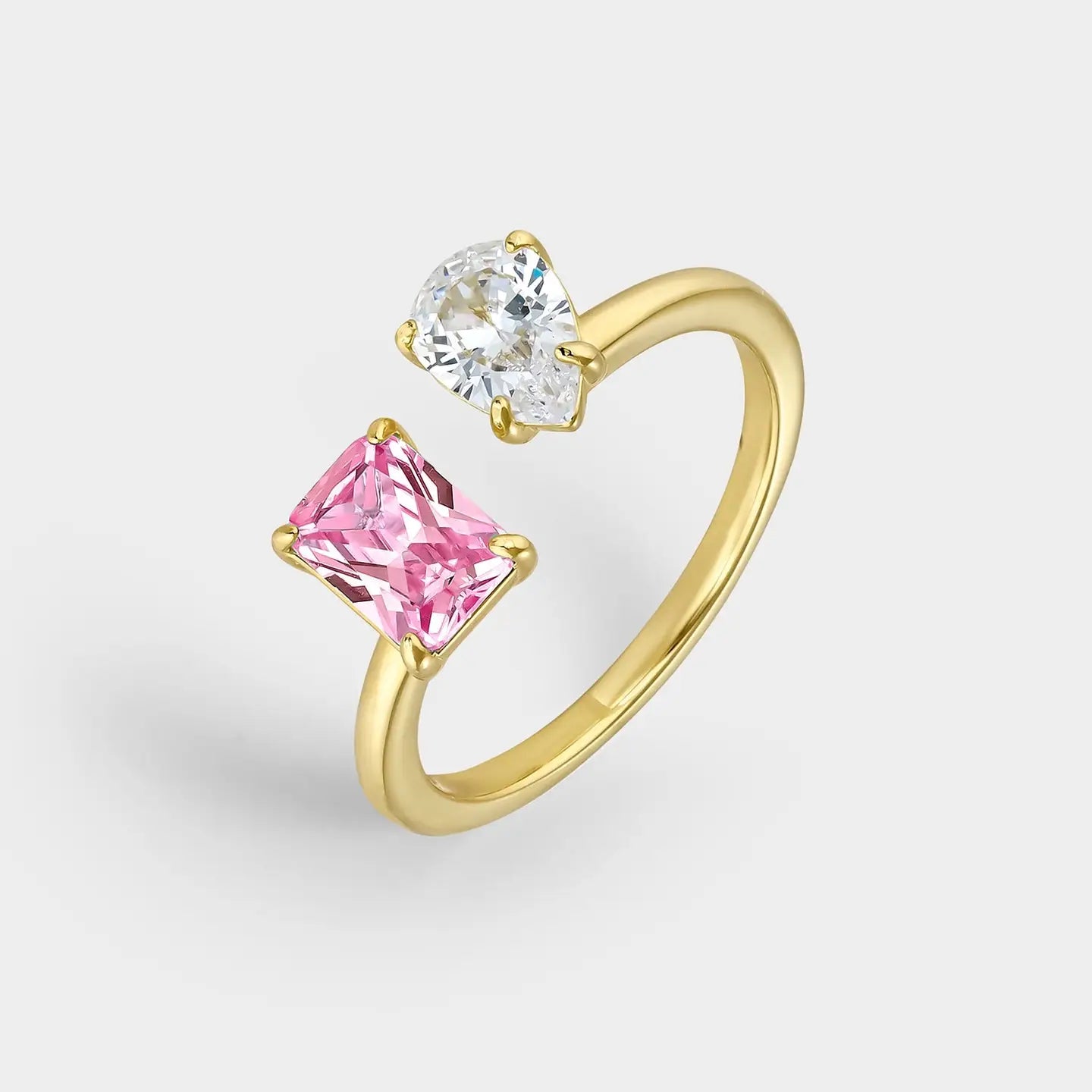 Duo ring with pink and white cubic zirconia, yellow gold plated